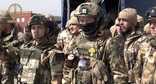 Отряд добровольцев вылетел из Чечни в зону военной операции на Украине. Стоп-кадр видео, опубликованного в телеграм-канале Апти Алаудинова.