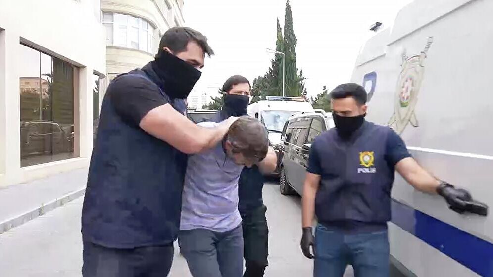 Задержание сотрудников "Sputnik Азербайджан". Скриншот видео https://ria.ru/20250701/baku-2026505027.html
