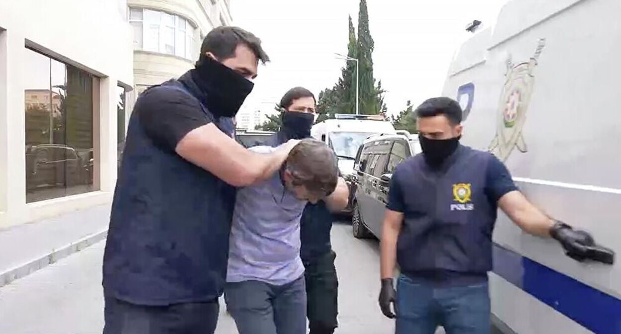Задержание сотрудников "Sputnik Азербайджан". Скриншот видео https://ria.ru/20250701/baku-2026505027.html